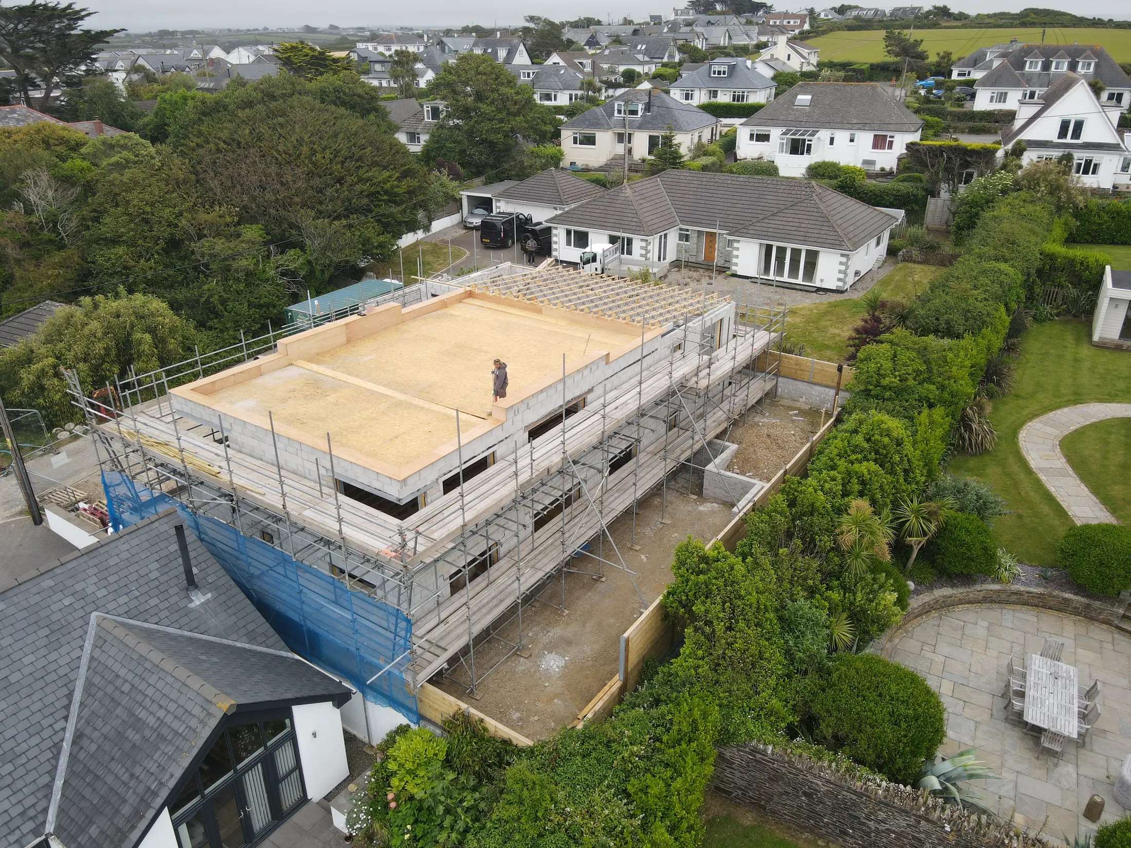 Earlier aerial view of the Porthscatho new build during roof construction